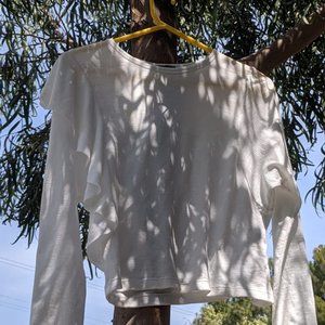 long sleeve white frilly top